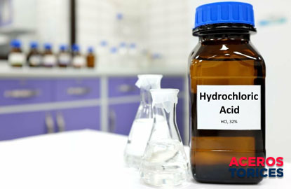 acido clorhidrico dentro de un frasco y matraces Ácido clorhídrico dentro de un frasco